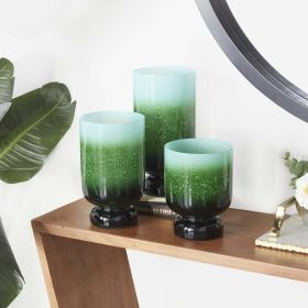 The Novogratz 3-Slot Green Glass Pillar Hurricane Lamp